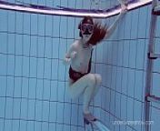 Roxalana Chech in scuba diving in the pool from deep sea scuba