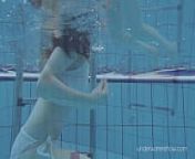 White swimsuit with tattoos babe Roxalana Cheh underwater from lynda carter wonder woman swimsuit