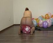 A fat girl in pantyhose sits down on balloons and pisses from a fat girl in pantyhose