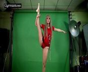 Red Dressed Gymnast Doing Spreads from gymnastics girls doing stretching