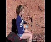 Outdoor teen Little April masturbates in solo session from walking nude selfie on beach