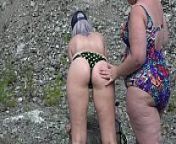 Lesbian licks a very hairy wet pussy outdoors. Oral caresses of two girlfriends with big asses. from very hairy lesbian pussy lick