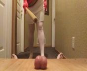 Ballbusting bat from cock and ball crush