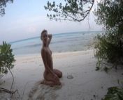 Naked girl on the ocean from nudism pageant junior camp