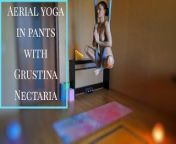 Workout in pants. Aerial yoga from nude pant