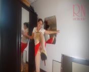 A naked lady does make-up in front of a mirror, puts on underwear, stockings, a skirt. 3 from 国模宋娅倩私拍内衣人体套图